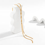 Flaira – Collana a serpente regolabile in oro