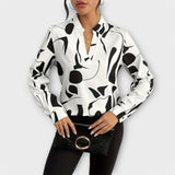 Elegante blusa con maniche lunghe e scollo a V