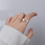 Bague en perles d'eau douce triple ajustable - 80 percento