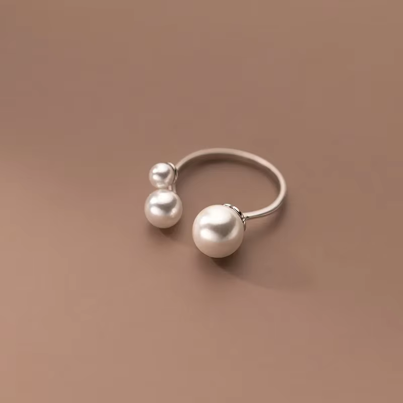 Bague en perles d'eau douce triple ajustable - 80 percento