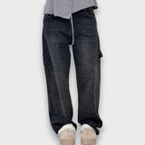 Nolene – Jeans con finitura scintillante e carattere urbano